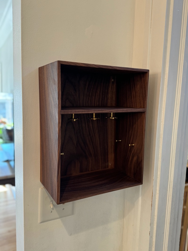 Walnut Key Cabinet: On the wall, from the side
